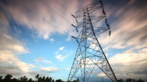 Stunning view of a towering power line against a vibrant sky, showcasing energy infrastructure in nature.